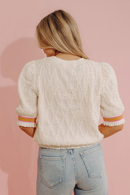 Charming Cues Ruffle Top in Cream