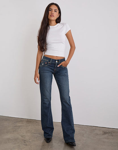 Low Rise Twisted Seam Jeans In Mid Blue Tint